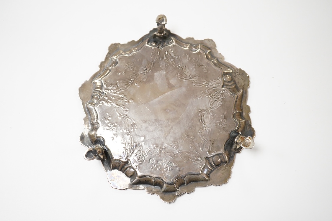 A George III silver waiter, John Cox, London, 1771, of shaped circular form, with later decoration, on three hoof feet, 16.7cm, 7.2oz.